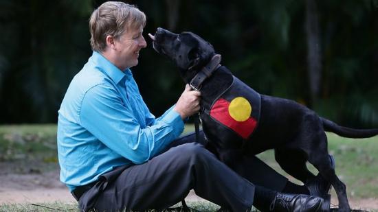 395645-dog-expert-gary-jackson-with-his-black-labrador-cross-migaloo.jpg