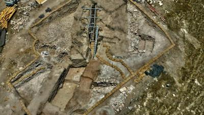 Aerial view showing stone covered plaza to the left of the corridor to the corbelled vault tel shimron credit eyecon 1536x864