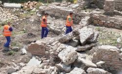 Ancient serdica ruins workers