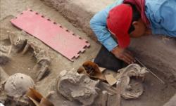 archaeologists-uncovering-skeletons-puebla.jpg