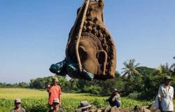 Enormous statue heads archaeology cambodia